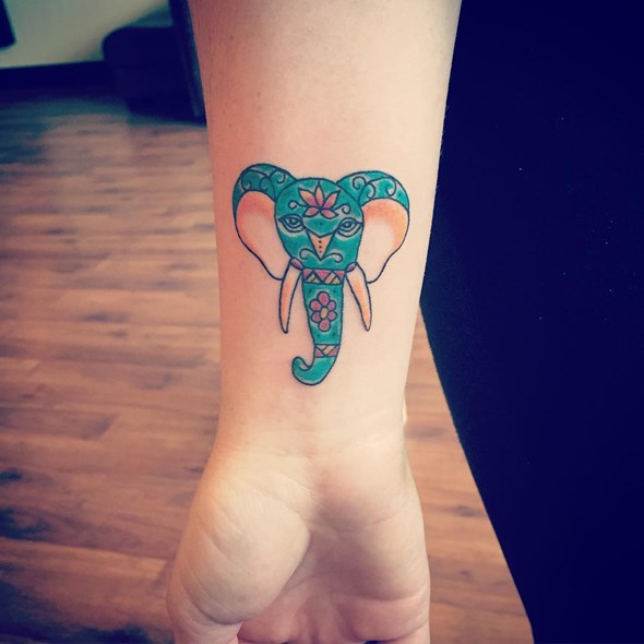 Colorful Elephant Head Tattoo On Right Wrist