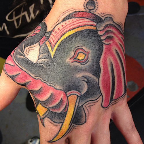 Colorful Elephant Head Trunk Up Tattoo On Left Hand