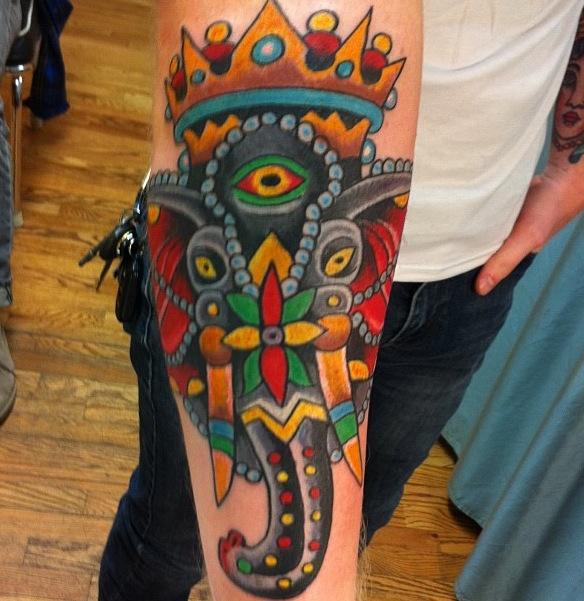 Colorful Traditional Crown On Elephant Head Tattoo On Right Arm