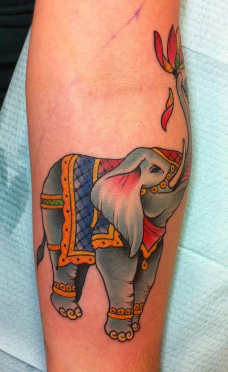 Colorful Traditional Elephant Trunk Up Tattoo On Forearm