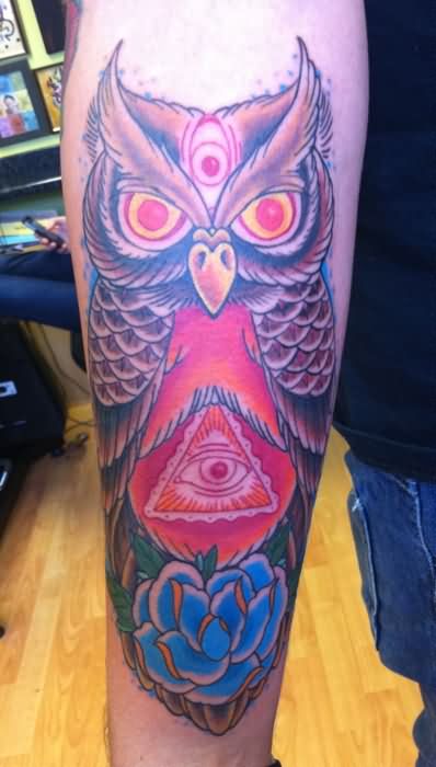 Colorful Traditional Triangle Eye In Owl With Flower Tattoo On Right Forearm