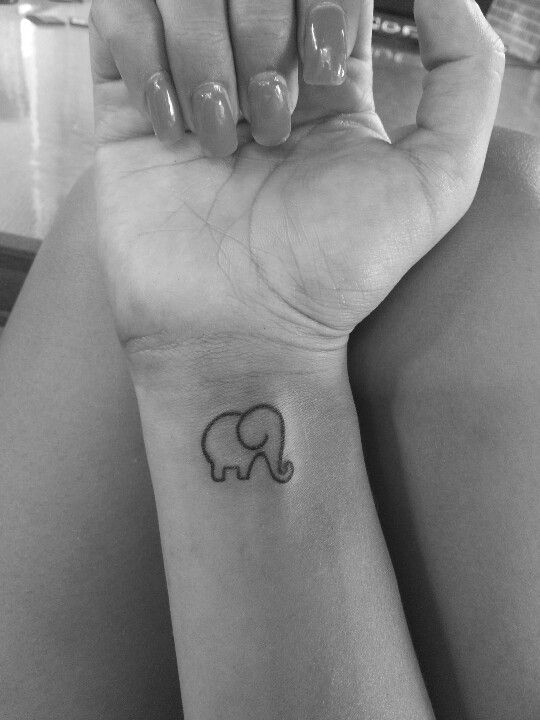 Cool Black Outline Baby Elephant Tattoo On Girl Wrist