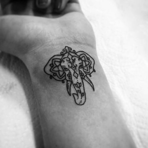 Cool Black Outline Elephant Head Tattoo On Girl Wrist