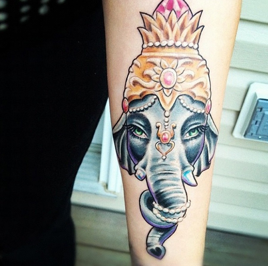 Cool Crown On Asian Elephant Head Tattoo On Forearm