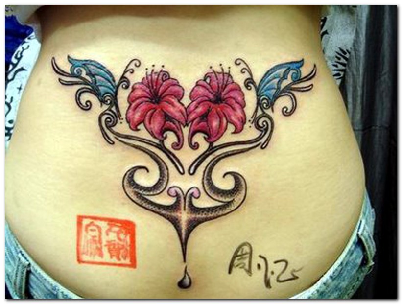 Cool Rhododendron Flowers Tattoo On Lower Back