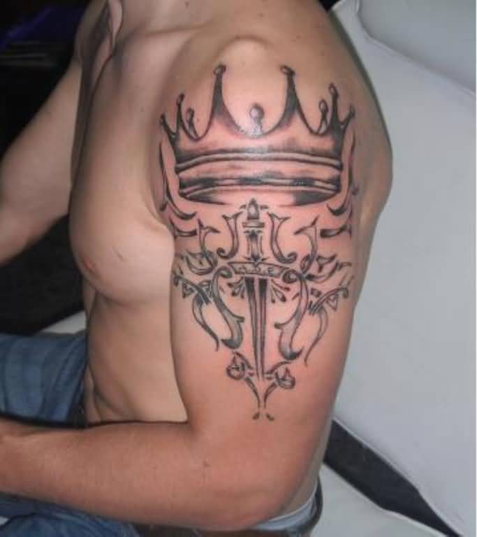 Cross And Crown Tattoo On Man Left Half Sleeve