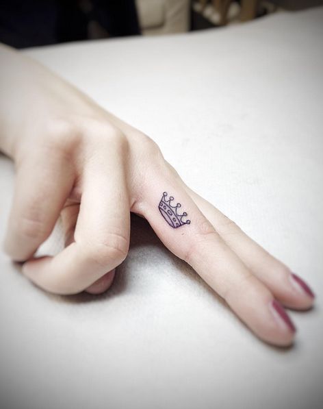 Crown Tattoo On Girl Side Finger
