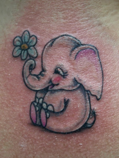 Cute Asian Baby Elephant With Flower Tattoo Design