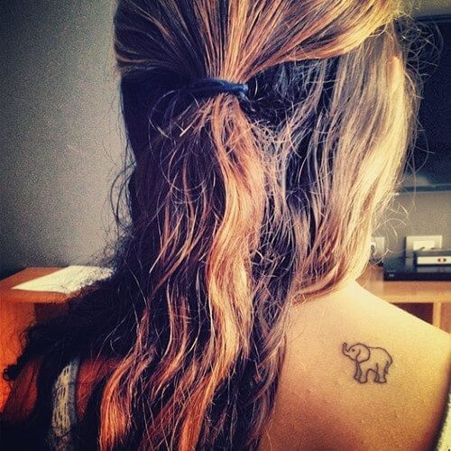 Cute Black Outline Elephant Tattoo On Girl Right Back Shoulder