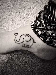 Cute Black Outline Elephant With Heart Tattoo On Foot