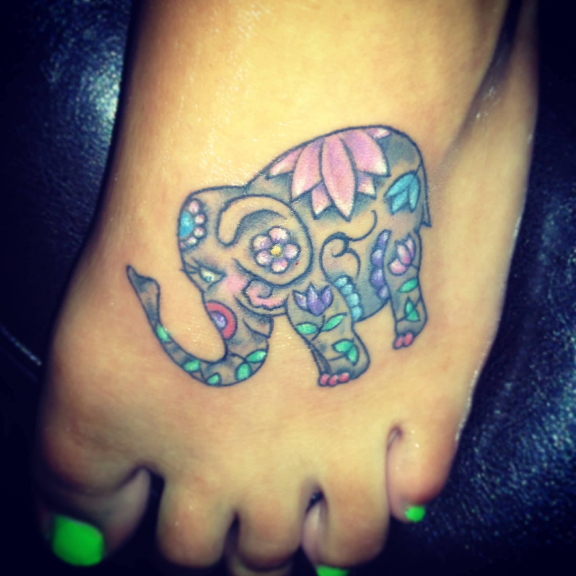 Cute Colorful Chinese Elephant Tattoo On Girl Left Foot