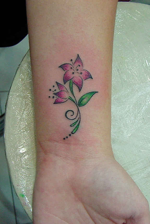 Cute Flower Tattoo On Left Wrist