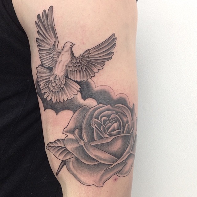 Cute Flying Dove And Rose Tattoo On Left Bicep