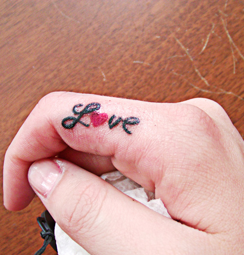 Cute Love Side Finger Tattoo Idea For Girls