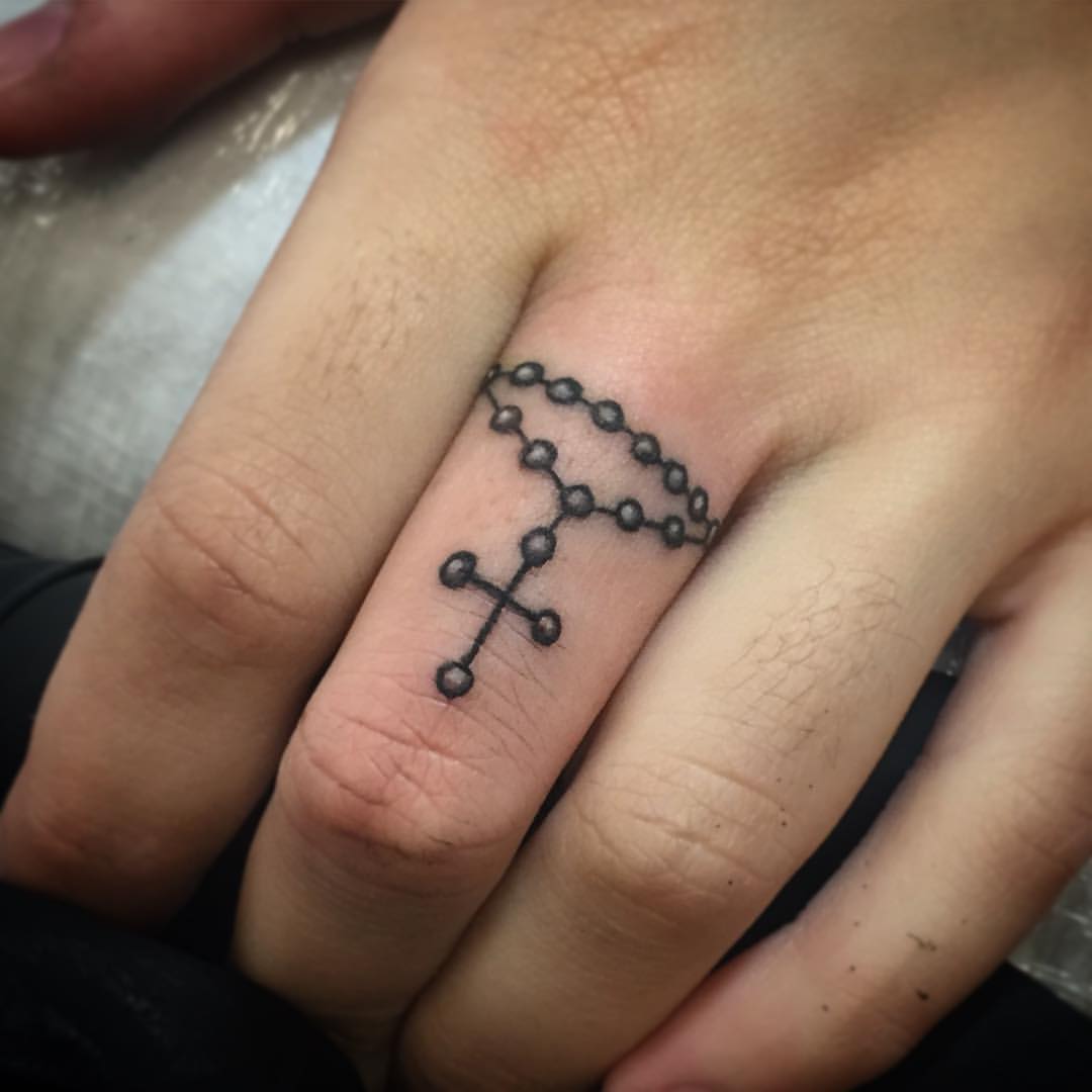 Cute Rosary Tattoo On Finger