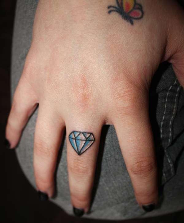 Diamond Tattoo On Girl Middle Finger