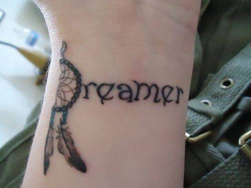 Dreamer Tattoo On Left Wrist For Men
