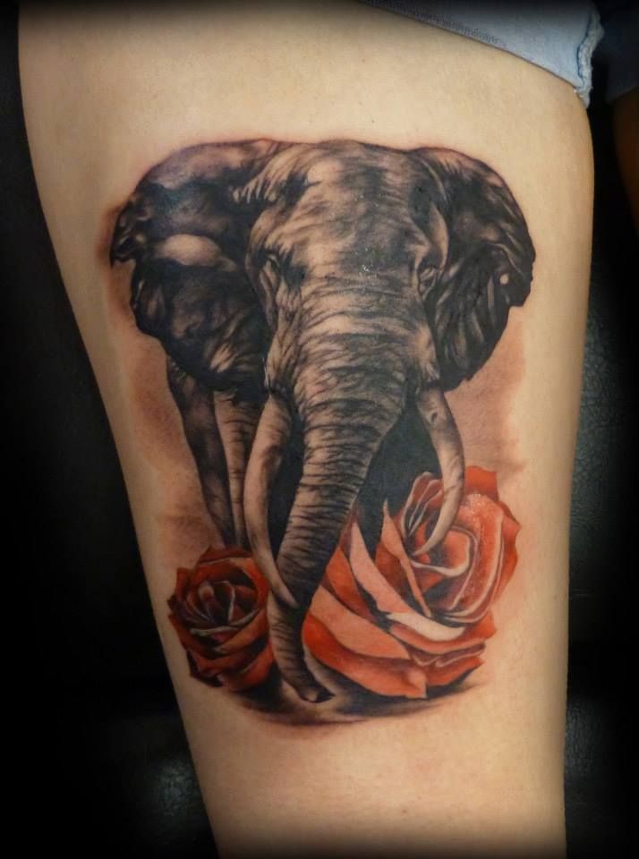 Elephant With Flowers Tattoo Design