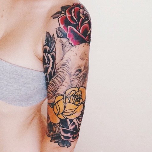 Elephant With Roses Tattoo On Girl Left Half Sleeve