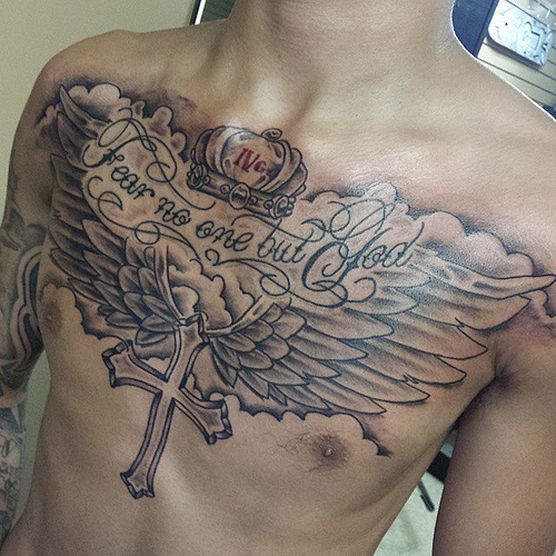 Fear No One But God And Winged Cross With Crown Tattoo On Chest