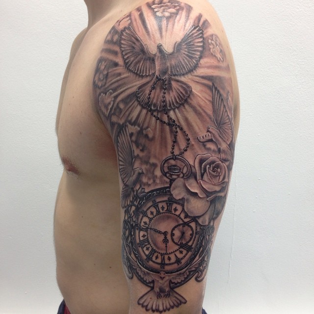 Flying Dove And Pocket Watch Tattoo On Man Left Half Sleeve