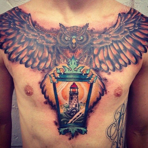 Flying Owl And Lighthouse In Lamp Tattoo On Chest