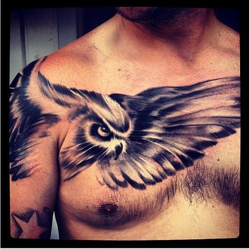 Flying Owl Tattoo On Man Chest