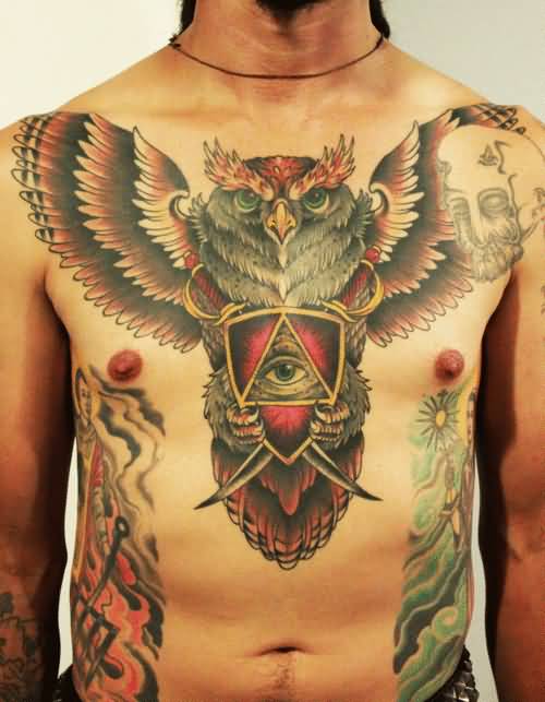Flying Owl With Crest In Claw Tattoo On Man Chest