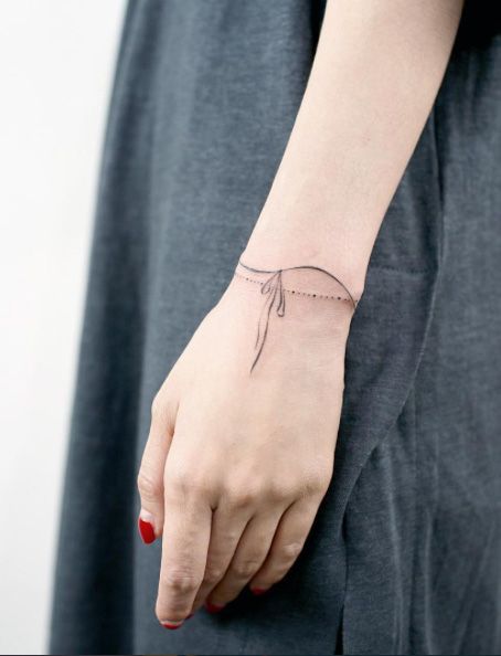 Girl Left Wrist Bracelet Tattoo