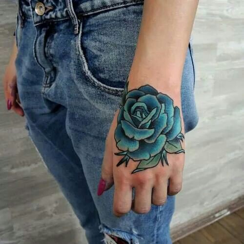 Girl With Blue Rose Tattoo On Left Hand