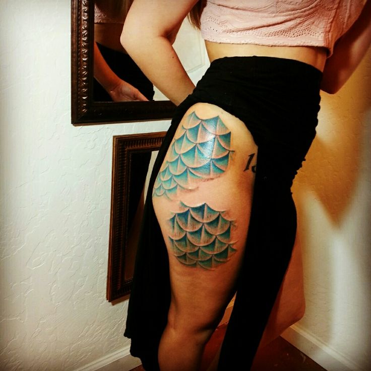 Girl With Mermaid Scale Tattoo On Side Leg