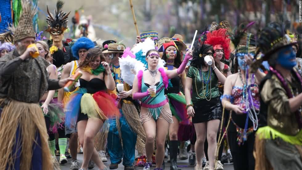 Girls Wearing Costumes During Mardi Gras Parade