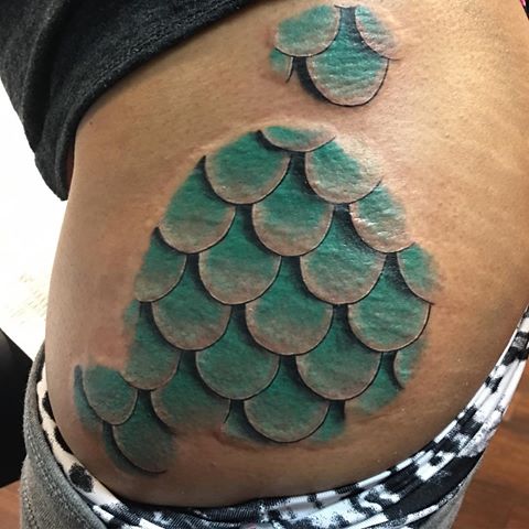 Green Ink Mermaid Scale Tattoo On Waist
