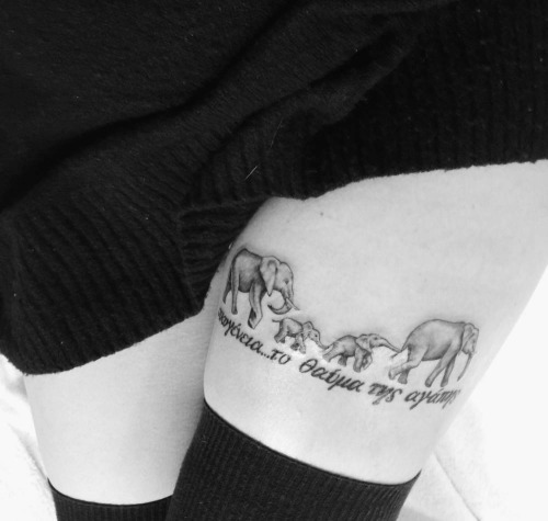Grey Ink Elephant Family Tattoo On Left Thigh