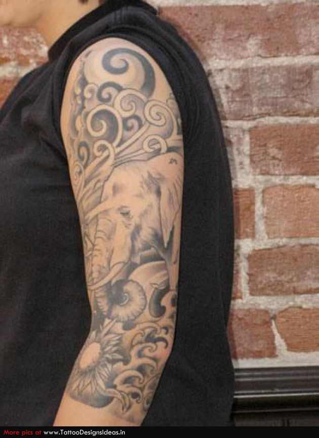 Grey Ink Elephant With Flower Tattoo On Left Sleeve