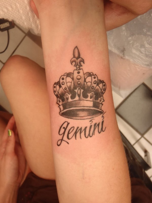 Grey Ink Gemini Crown Tattoo On Wrist