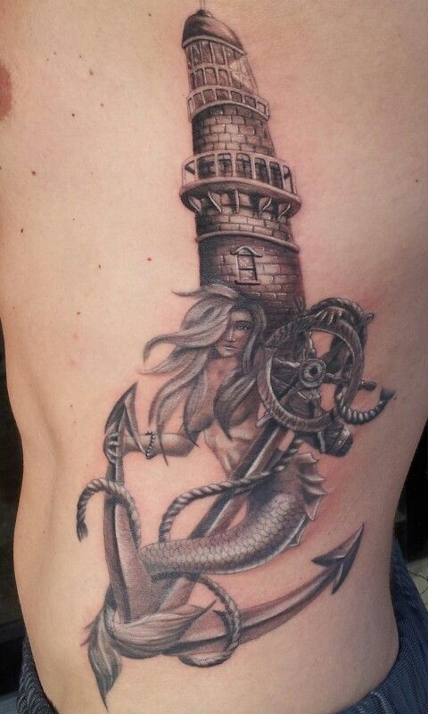 Grey Ink Mermaid And Anchor Tattoo On Side Rib