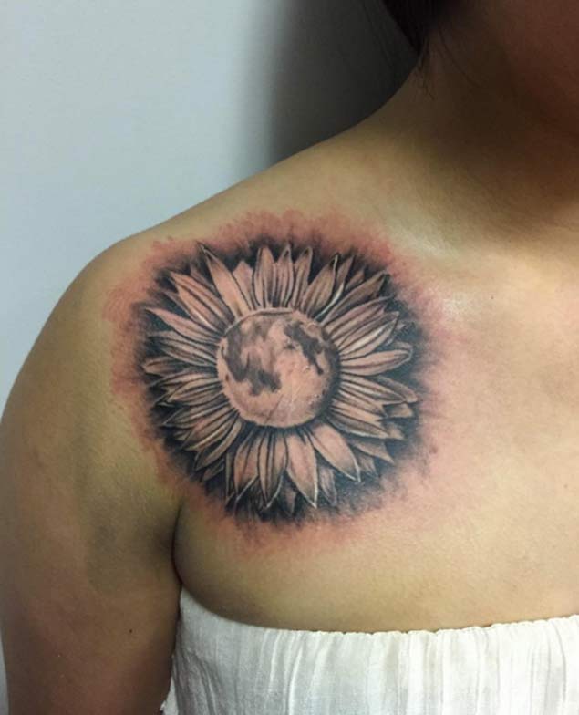 Grey Ink Realistic Sunflower Tattoo On Front Shoulder