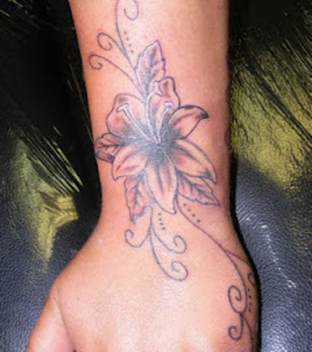 Grey Lily Flower Wrist Tattoo