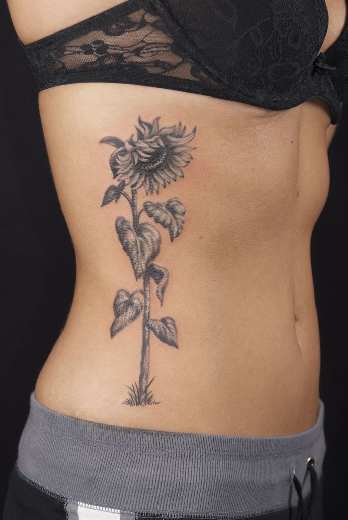 Grey Realistic Sunflower Tattoo On Side Rib