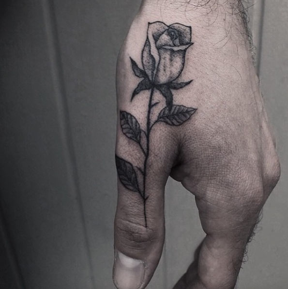 Grey Rose Bud Tattoo On Left Hand