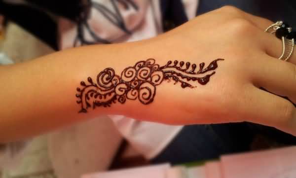 Henna Flower Tattoo On Side Hand For Women