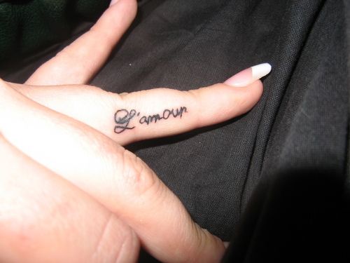 I am Own Tattoo On Side Finger