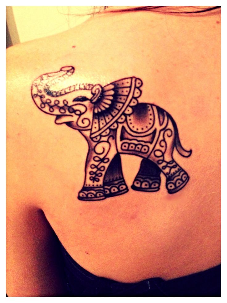 Impressive Black Ink Elephant Tattoo On Girl Left Back Shoulder By Diane Smith