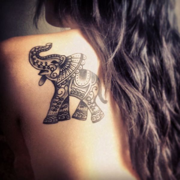 Impressive Black Ink Elephant Trunk Up Tattoo On Left Back Shoulder By Criss Rock