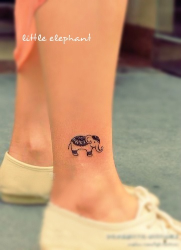 Impressive Black Small Henna Elephant Tattoo On Right Leg