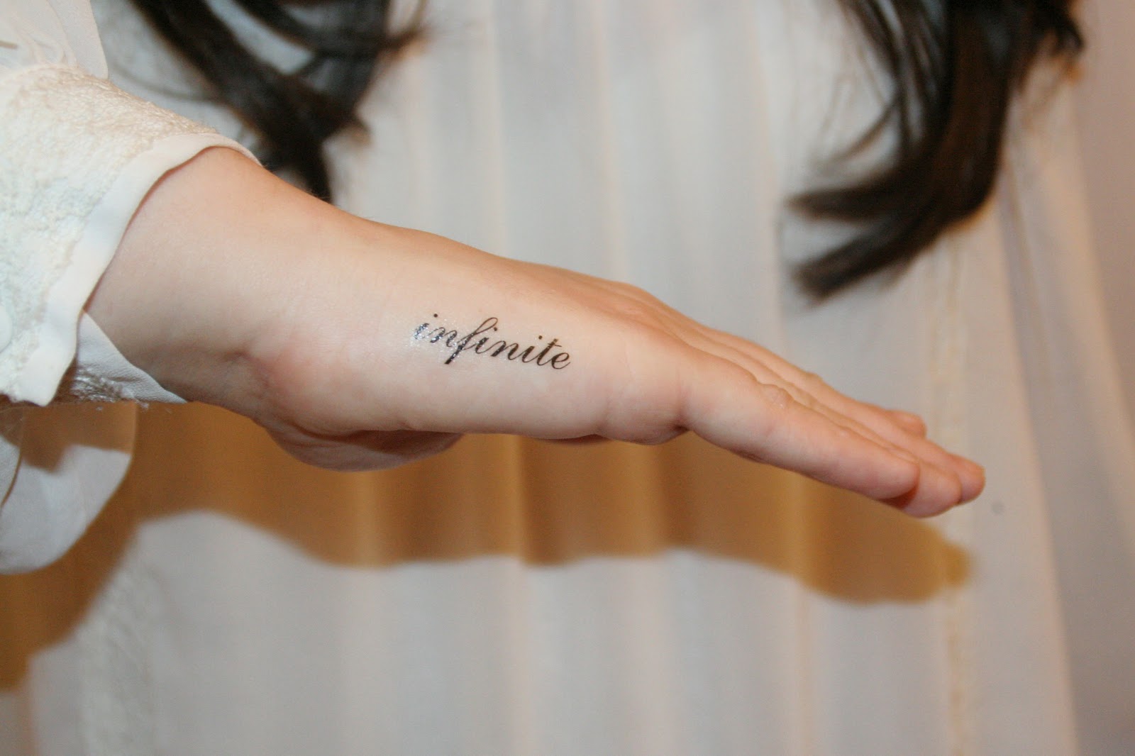 Infinite Tattoo On Side Hand