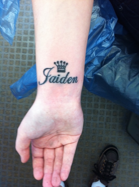 Jaiden Crown Tattoo On Right Wrist