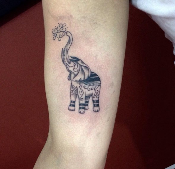 Latest Black Ink Elephant Tattoo On Bicep