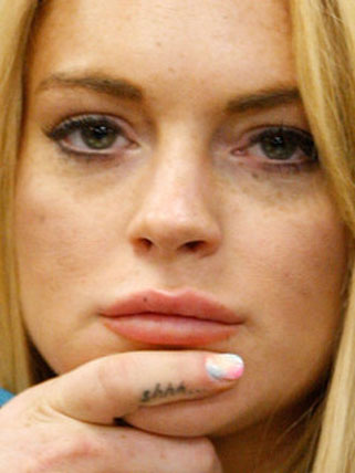 Lindsay Lohan Side Finger Tattoo